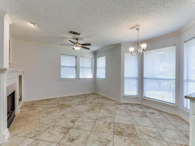 unfurnished living room featuring a fireplace, crown molding, visible vents, a textured ceiling, and ceiling fan with notable chandelier