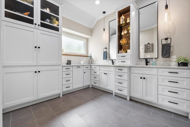 bar with recessed lighting, a sink, crown molding, pendant lighting, and tile patterned flooring