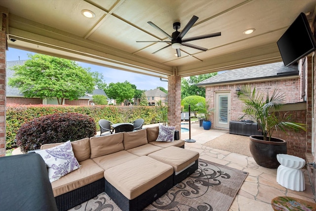 view of patio / terrace featuring ceiling fan and an outdoor hangout area