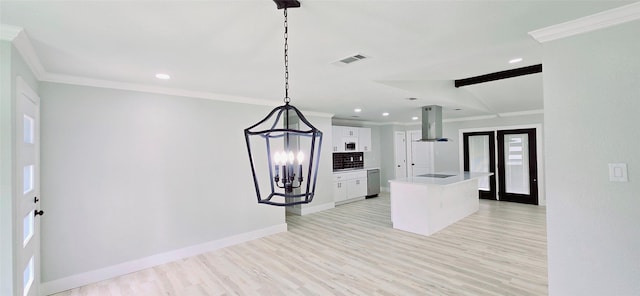 kitchen featuring stainless steel dishwasher, white cabinets, visible vents, recessed lighting, and island exhaust hood