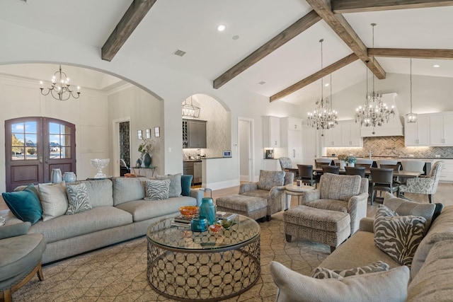 4260 Tranquility Ln, Prosper, TX 75078 - living room with an inviting chandelier, beam ceiling, high vaulted ceiling, and arched walkways