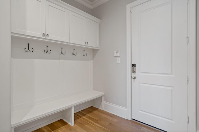 4260 Tranquility Ln, Prosper, TX 75078 - mudroom with baseboards, light wood-type flooring, and ornamental molding