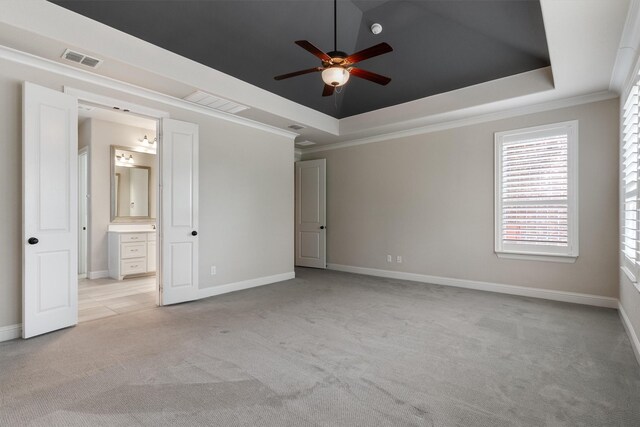 3404 Ophel Way, Flower Mound, TX 75028 - unfurnished bedroom with light colored carpet, a raised ceiling, baseboards, and visible vents