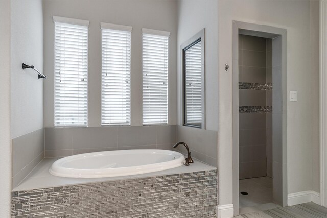3404 Ophel Way, Flower Mound, TX 75028 - bathroom featuring a tile shower and a bath