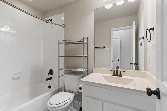 3404 Ophel Way, Flower Mound, TX 75028 - full bath featuring vanity, a textured wall, washtub / shower combination, and toilet