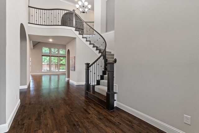 3404 Ophel Way, Flower Mound, TX 75028 - interior space with arched walkways, baseboards, a chandelier, and wood finished floors
