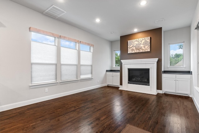 3404 Ophel Way, Flower Mound, TX 75028 - unfurnished living room with visible vents, dark wood-style flooring, a fireplace, baseboards, and recessed lighting