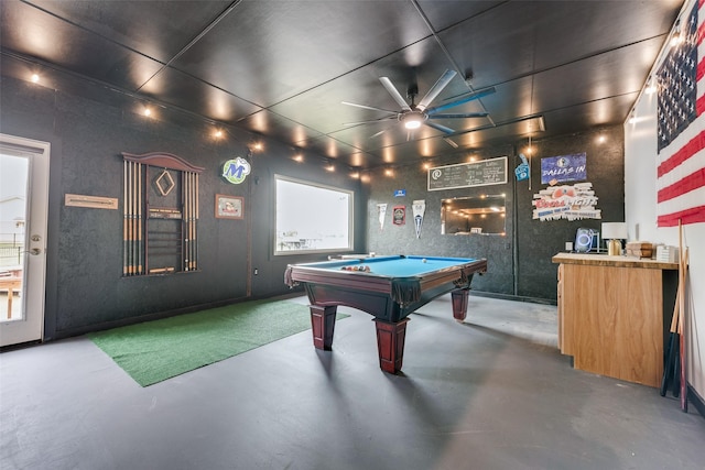 playroom with a ceiling fan, finished concrete flooring, and billiards