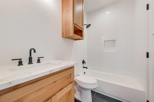 bathroom featuring toilet, tile patterned floors, shower / bathing tub combination, and vanity
