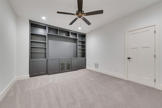 unfurnished living room with ceiling fan, visible vents, baseboards, carpet, and recessed lighting