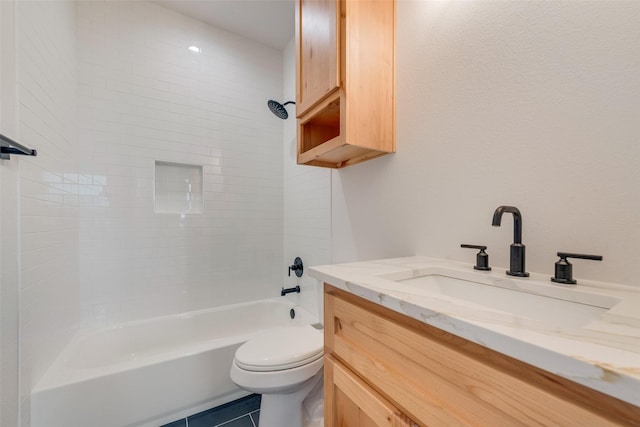 full bath featuring vanity, tile patterned flooring, bathtub / shower combination, and toilet