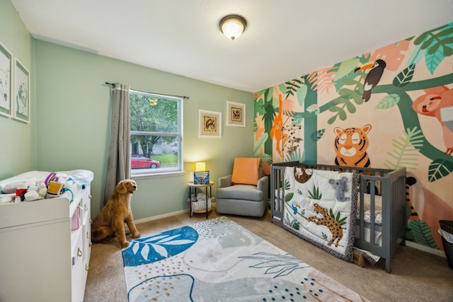 interior space featuring carpet flooring and baseboards