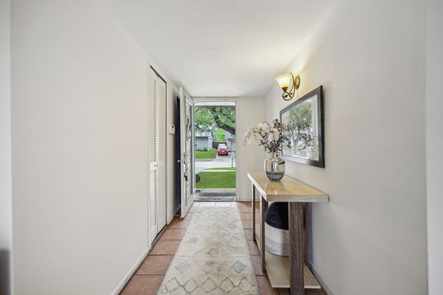 interior space with light tile patterned floors