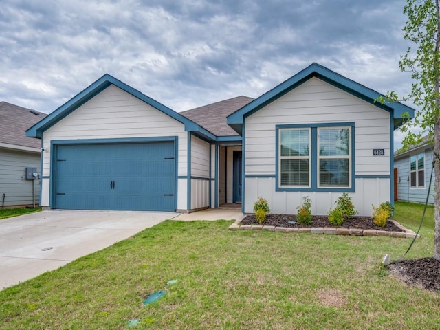 single story home featuring board and batten siding, a front yard, concrete driveway, and an attached garage
