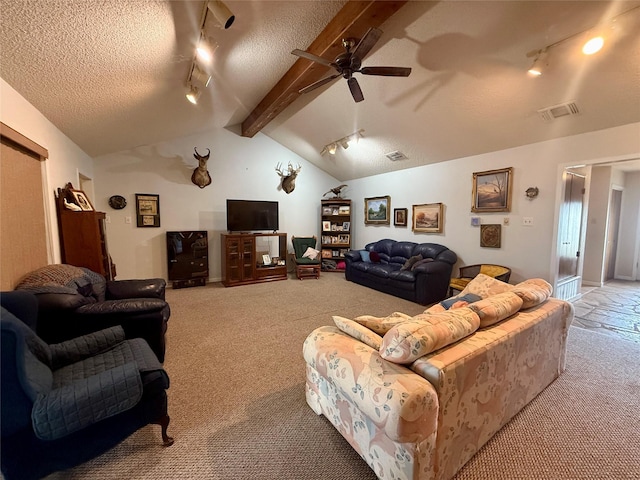 living room featuring visible vents, ceiling fan, rail lighting, and carpet