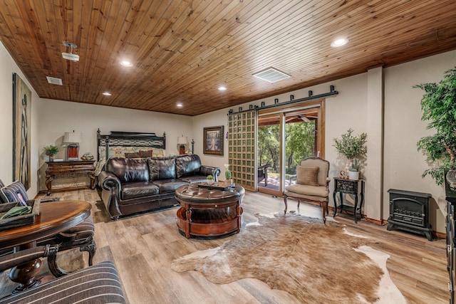 11900 Wind Hollow Ct, Tolar, TX 76476 - living area featuring a wood stove, wood finished floors, recessed lighting, and wood ceiling