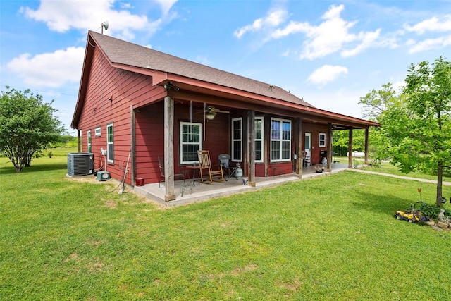 back of house with a lawn, a patio area, central air condition unit, and ceiling fan