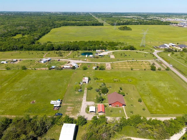 birds eye view of property with a rural view