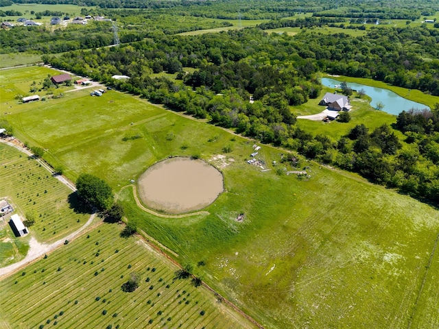 aerial view featuring a rural view and a water view