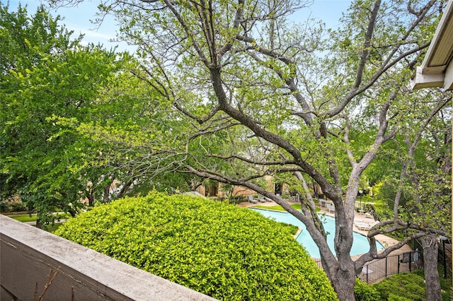 view of yard featuring an outdoor pool