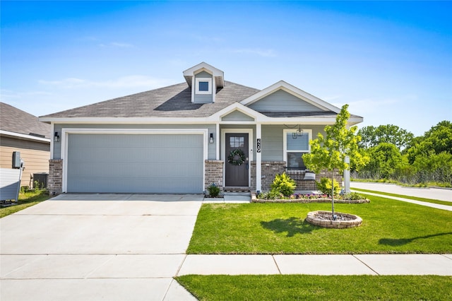craftsman inspired home featuring a front yard, a garage, covered porch, driveway, and brick siding