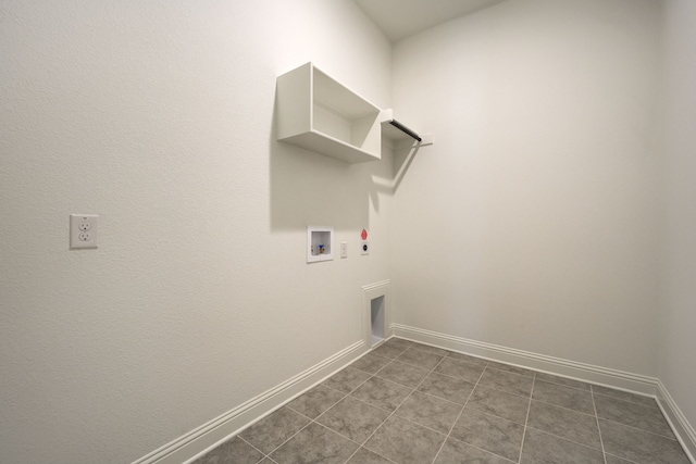laundry area featuring hookup for a washing machine, laundry area, electric dryer hookup, hookup for a gas dryer, and baseboards