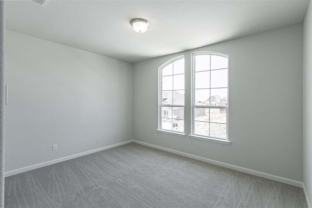 3406 Tilley Ct, Rockwall, TX 75087 - carpeted spare room featuring baseboards