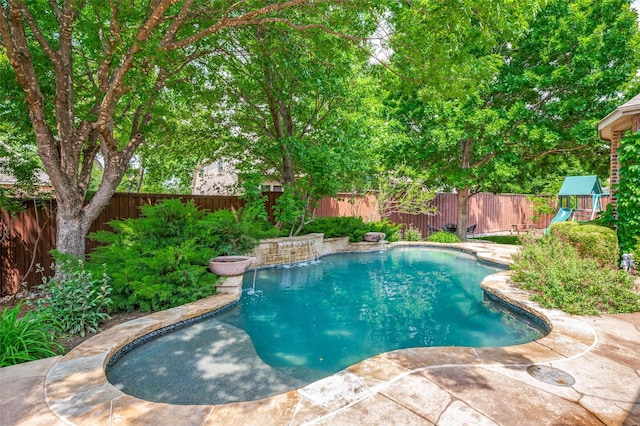 881 Willowmist Dr, Prosper, TX 75078 - view of pool featuring a fenced backyard and a playground