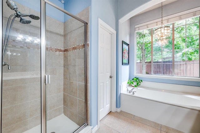 881 Willowmist Dr, Prosper, TX 75078 - full bath with a stall shower, a chandelier, a garden tub, and tile patterned flooring