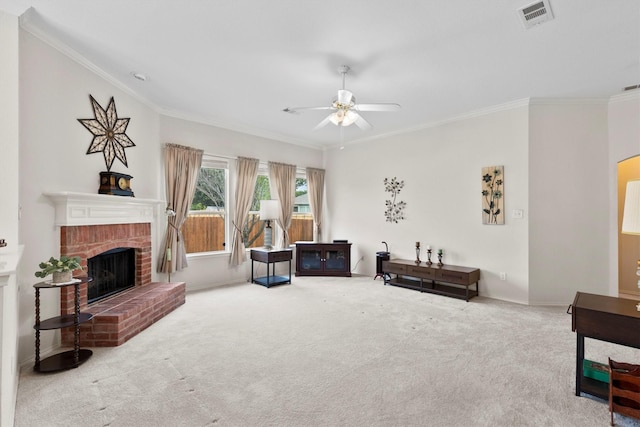 carpeted living area with crown molding, visible vents, baseboards, a fireplace, and a ceiling fan