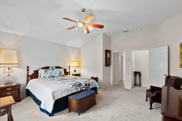 bedroom featuring vaulted ceiling, light carpet, ceiling fan, baseboards, and visible vents