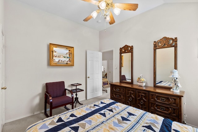 carpeted bedroom featuring ceiling fan, lofted ceiling, and baseboards