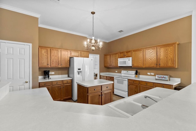 kitchen featuring an inviting chandelier, a sink, white appliances, light countertops, and ornamental molding