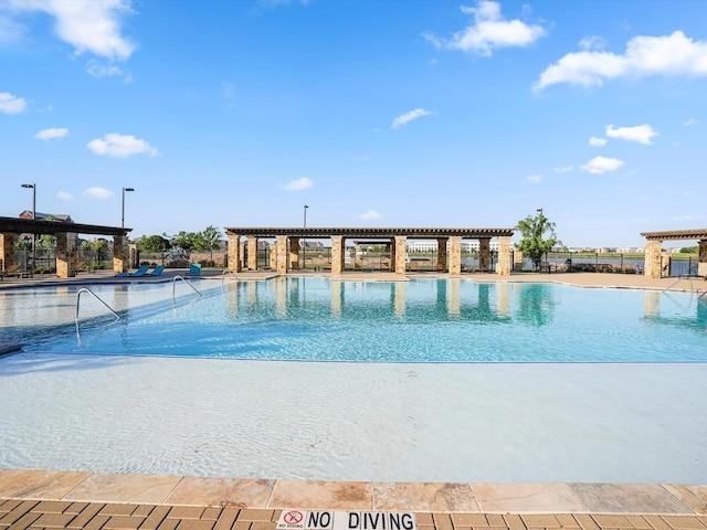 community pool with fence