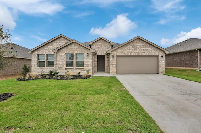 ranch-style house with driveway, a front yard, an attached garage, and stone siding