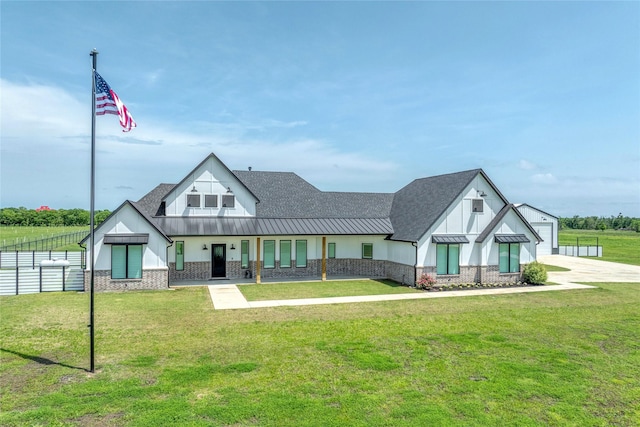 450 County Road 2411, Valley View, TX 76272 - view of front of property featuring fence, a front lawn, a shingled roof, and a standing seam roof