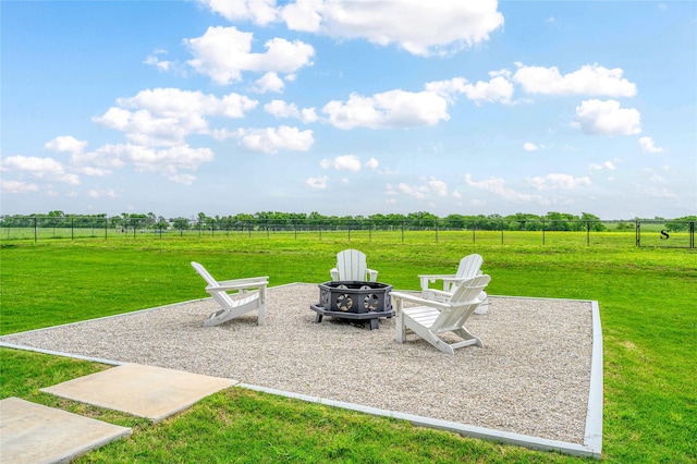 450 County Road 2411, Valley View, TX 76272 - view of patio / terrace featuring an outdoor fire pit, fence, and a rural view
