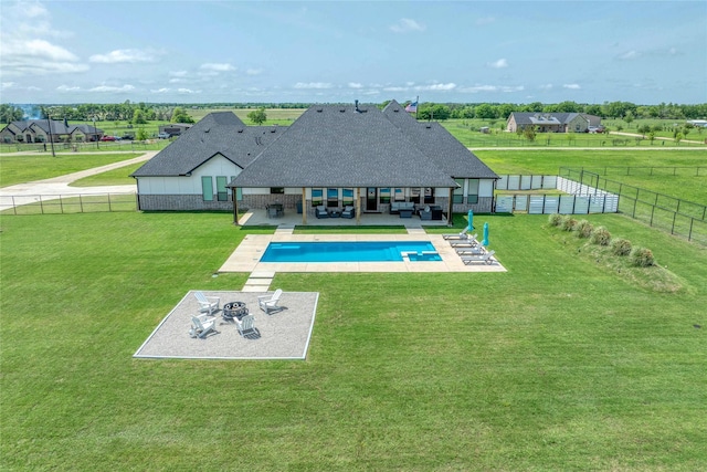 450 County Road 2411, Valley View, TX 76272 - view of swimming pool featuring a fenced backyard, a yard, a fenced in pool, an outdoor living space with a fire pit, and a patio area