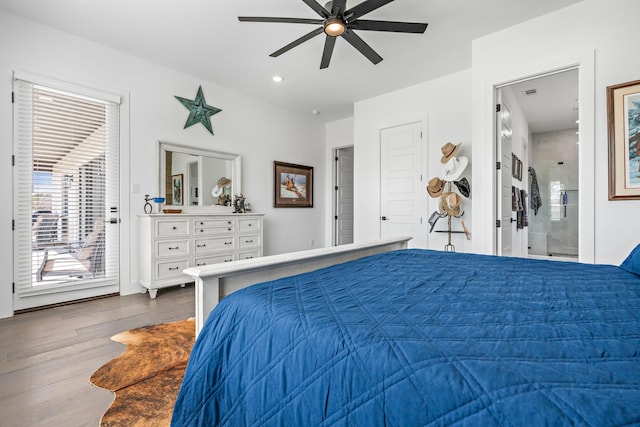 bedroom with recessed lighting, wood finished floors, ensuite bath, access to exterior, and a ceiling fan