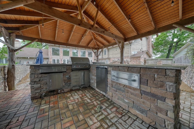 view of patio / terrace featuring exterior kitchen and area for grilling