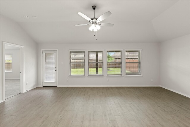 3246 Baehr, Royse City, TX 75189 - unfurnished living room featuring lofted ceiling, ceiling fan, and wood finished floors