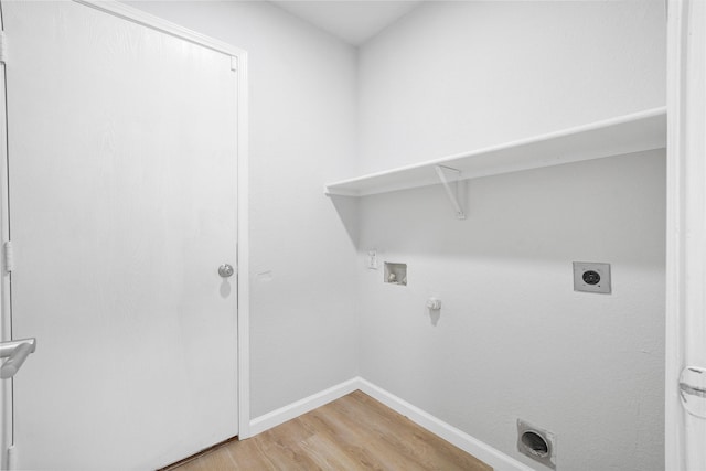 washroom featuring hookup for an electric dryer, light wood finished floors, laundry area, hookup for a washing machine, and baseboards
