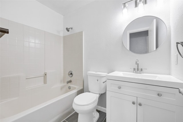 full bathroom featuring vanity, toilet, visible vents, and tub / shower combination