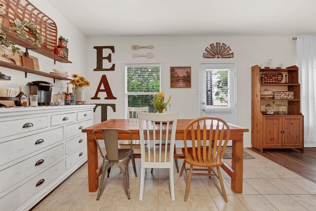 dining room with light tile patterned floors