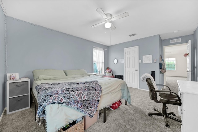 bedroom featuring carpet flooring, baseboards, and visible vents