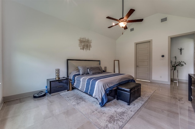bedroom featuring baseboards, visible vents, and high vaulted ceiling