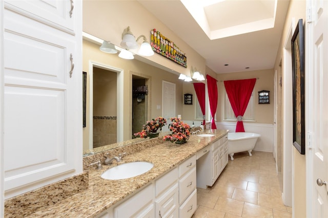 1515 Brighton Dr, Carrollton, TX 75007 - full bath featuring tile patterned flooring, a sink, double vanity, and a soaking tub