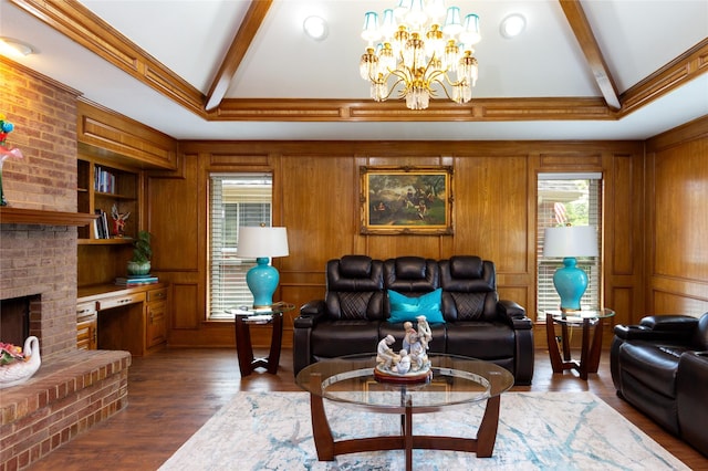 1515 Brighton Dr, Carrollton, TX 75007 - living room with lofted ceiling with beams, an inviting chandelier, wooden walls, a brick fireplace, and wood finished floors