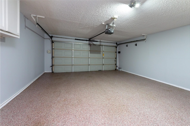 1515 Brighton Dr, Carrollton, TX 75007 - garage with baseboards and a garage door opener