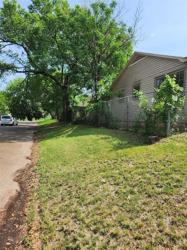 view of yard featuring fence